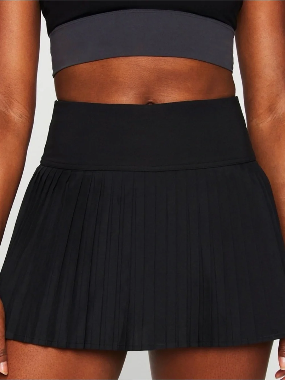 Fabletics Pleated Mini Skirt Duo in Pink and Black